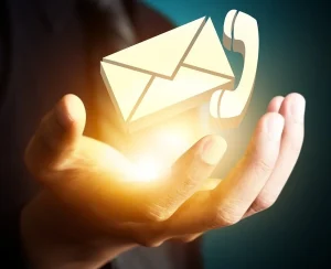 Contact-Grace Agros page- picture of a hand, phone and envelope